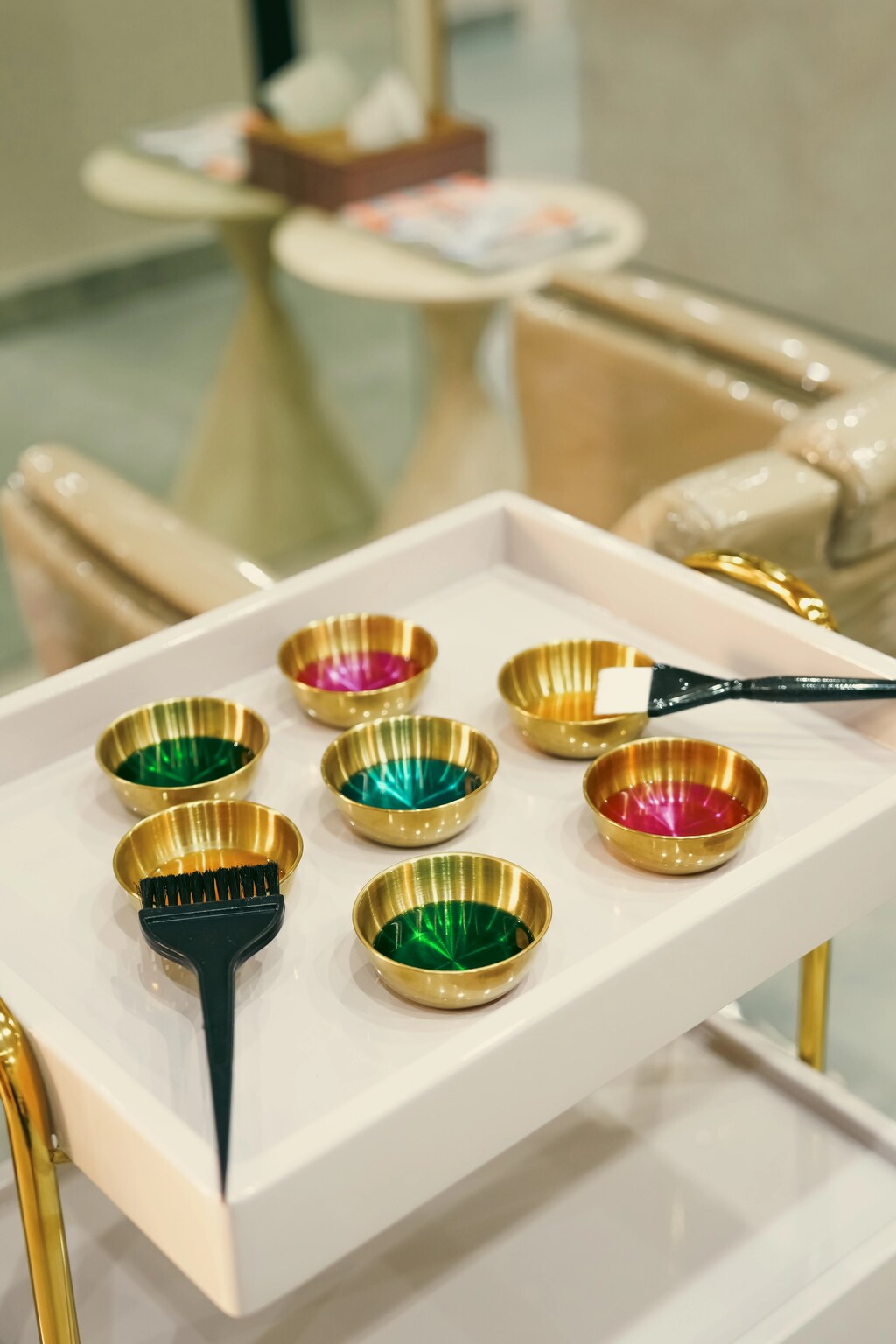 Professional hair coloring station with premium dye bowls and brushes at Ellé Égante Spa